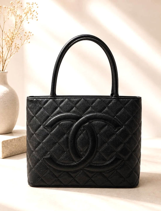 CHANEL Medallion Black Caviar Skin Handbag